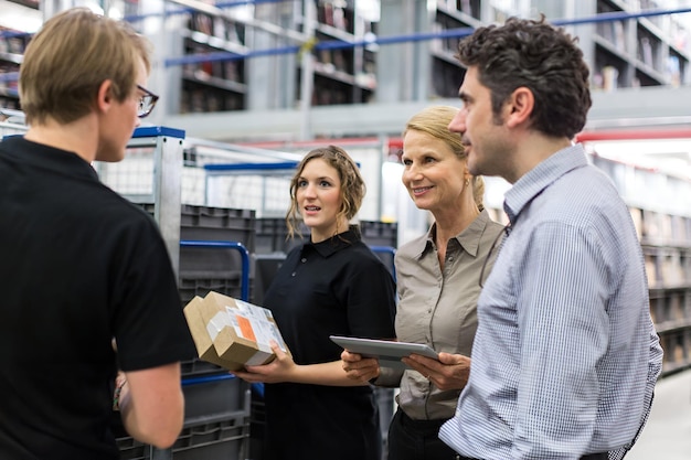 logistics team discussing delivery schedules stock 774935 3969